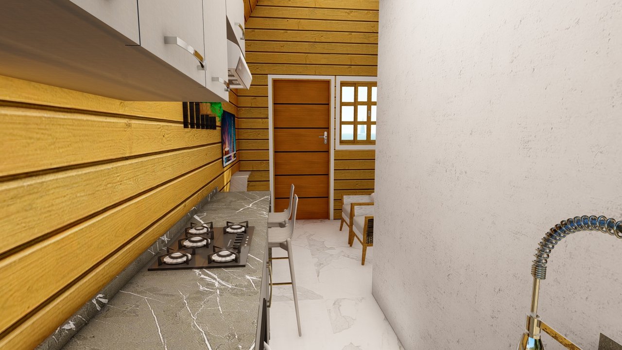 Interior da Pousada POP 1.2 — cozinha em direção à porta Cozinha da Pousada POP 1.2 vista em direção à porta principal