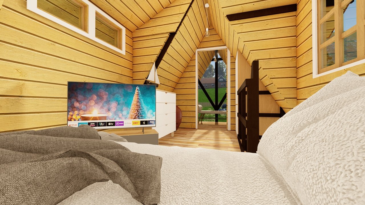 Pousada POP 1.14 38,97m² — Quarto no mezanino com foco na televisão Pousada POP 1.14 38,97m² pré-fabricada em madeira pinus autoclave — quarto no mezanino com foco na televisão