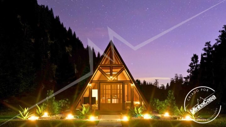 Chalé A-Frame 1.1 de 48m² pré-fabricado em madeira pinus autoclave — fachada principal em ângulo central de noite